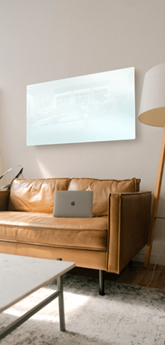 Image of a white Yandiya glass heating panel installed high above the wall in a front room
